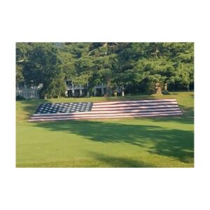 Us flag painted with ussc stencil aerosol paint on golf course fairway pga tournament.