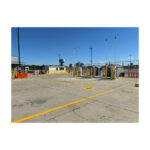 Concrete parking lot painted with durable rough fast dry tough one component solvent base chlorinated rubber resin traffic paint from manufacturer.