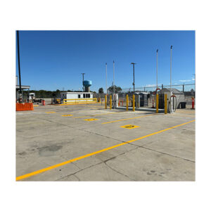 Concrete parking lot painted with durable rough fast dry tough one component solvent base chlorinated rubber resin traffic paint from manufacturer.