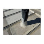 Clear Sealant Applied Around Vent Base On Metal Roof For Waterproofing