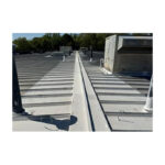 Long Corrugated Metal Roof With Sealant Coating And Repair Lines