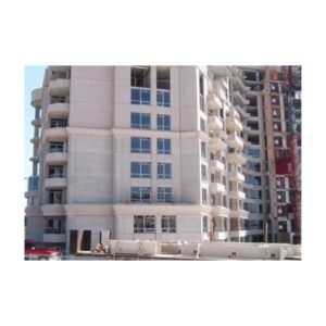 Application Of Brick Red Heat IR Reflecting Concrete Coating On Apartment Building.