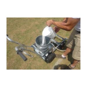 Striping soccer field with field marking paint.