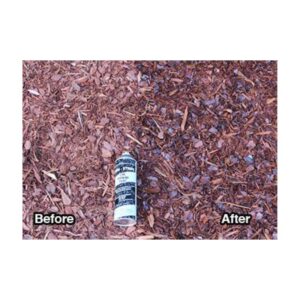 Aerosol Can Placed On Mulch Bed Surface In Outdoor Setting