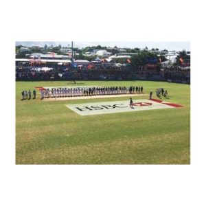 Branded Corporate Logo Stencil Applied On Sports Field Grass