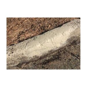 Close-Up Of Cracked Curb Surface Before Applying Repair Solution