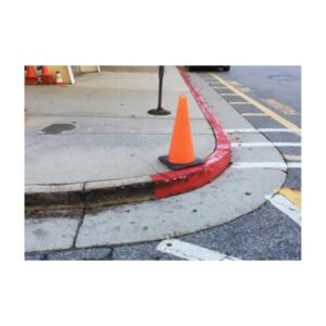 Orange Cone Protecting Wet Yellow Curb Paint On Sidewalk Corner