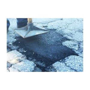Compact In Place Asphalt Patching Material Using Metal Tamper Tool.
