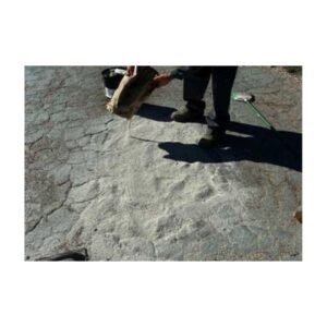Worker Preparing Pavement Surface For Patching Or Sealing