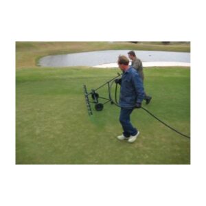 Golf Course Putting Green Grass Dye Paint Application.