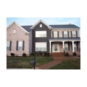 Home Concrete Stone Masonry Facade Painted With Lithium Concrete Coating.