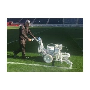 White chalk removable bulk paint for natural grass sprayed applied using bulk spray machine.