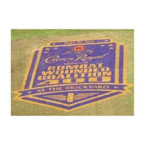 Purple And Gold Logo Stencil Painted On Sports Field For Branding