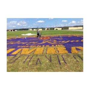 Painting Corporate Company Logo In Progress By Paint Crew At Special Project.