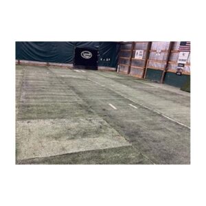Old synthetic used turf with permanent sewed in line getting painted with permanent green paint.