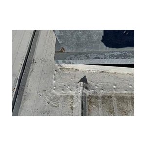 Metal Roof Sealed With Waterproof Coating Around Vent Pipe