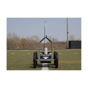 Field Striping Machine On Grassy Field With Trees In Background