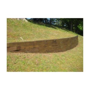 Wooden Retaining Wall Along Grassy Slope