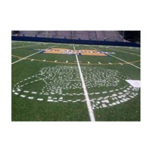 Football team logo stencil painting synthetic turf field.