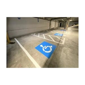 Blue Handicap Parking Symbol Painted On Warehouse Floor