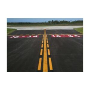 Painted Runway Markings On Asphalt Surface Near Aircraft Hangar