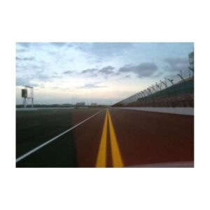 Highway Road Surface With Sunset And Clear Centerline Markings