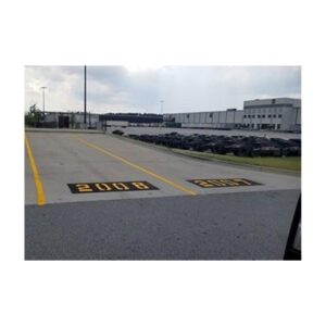Warehouse Pavement With Bold Yellow Directional Markings